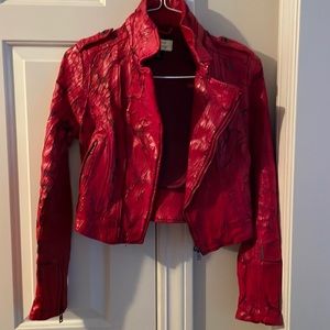 Guess distressed faux leather jacket in red.